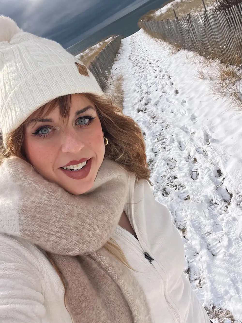 Emma Shorebreak walking Herring Cove Beach in the snow during a December visit to Provincetown Cape Cod