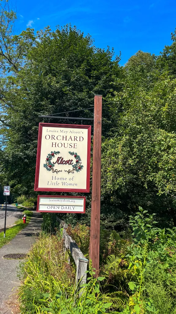 The wooden sign outside Orchard House in Concord, Massachusetts, home of Louisa May Alcott